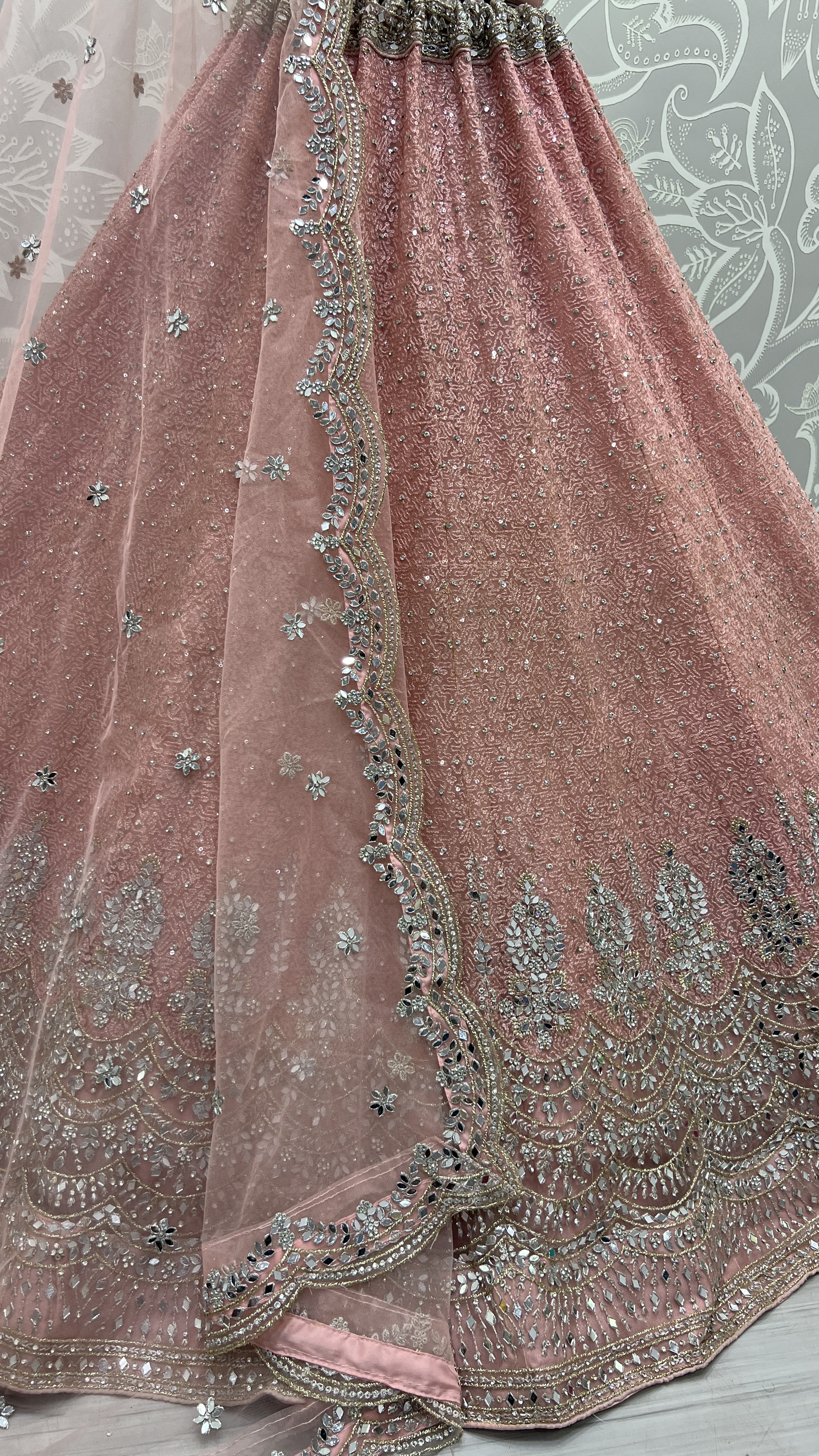 Invaluable Pink Sequins Embroidered Net Wedding Wear Lehenga Choli